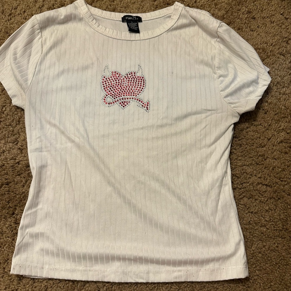 White t shirt with detailing.